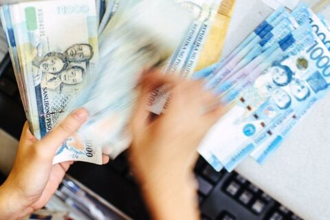 تقویت پزو فیلیپین برابر دلار با کناره‌گیری بانک مرکزی از مداخله